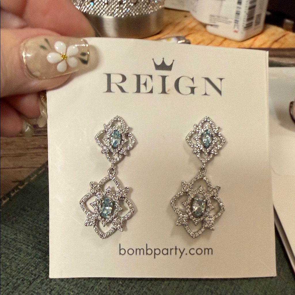 Reign Silver Drop Earrings With Light Blue Gem Accents